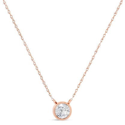 AGS Certified 10K Rose Gold 1/5 Cttw Bezel Set Round Diamond Solitaire 16-18" Adjustable Pendant Necklace (I-J Color, VS1-VS2 Clarity)